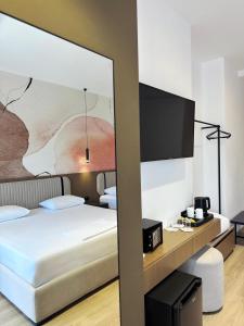 Katil atau katil-katil dalam bilik di Monun Hotel