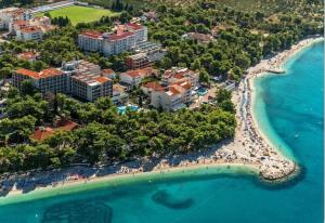 an aerial view of a beach and the ocean at Villa Marie in Baška Voda