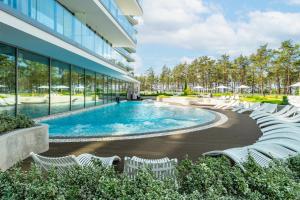 Bazén v ubytovaní WAVE private apartament - Sea View alebo v jeho blízkosti