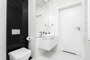 Kúpeľňa v ubytovaní WAVE private apartament - Sea View