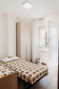 Postel nebo postele na pokoji v ubytování A Casa di Leo