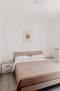 Postel nebo postele na pokoji v ubytování A Casa di Leo