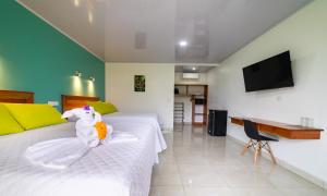 Sjónvarps- og/eða afþreyingartæki á Hotel Secreto La Fortuna