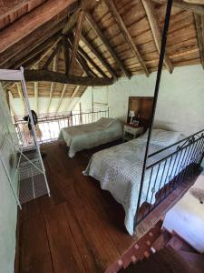 Postel nebo postele na pokoji v ubytování Cabaña Montana Socorro Santander