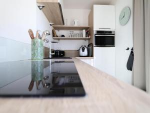 Η κουζίνα ή μικρή κουζίνα στο Penthouse in Knokke near Beach and Lippenslaan