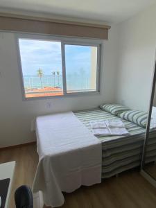 Postel nebo postele na pokoji v ubytování Apt Boreal Salvador