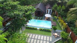 an aerial view of a house with a swimming pool at Rue DeuxVilles Villa in Loon