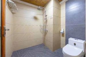 Kúpeľňa v ubytovaní Zhangjiajie Wulingju Hotel