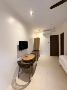 Μια τηλεόραση ή/και κέντρο ψυχαγωγίας στο Orchrd Lodge