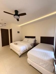 Ένα ή περισσότερα κρεβάτια σε δωμάτιο στο Orchrd Lodge