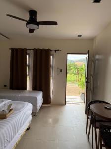 Ένα ή περισσότερα κρεβάτια σε δωμάτιο στο Orchrd Lodge