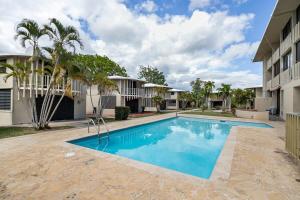 a swimming pool in front of a building at EcoMar Rentals: Villa in Cabo Rojo