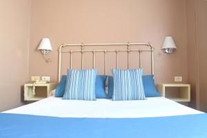 Voodi või voodid majutusasutuse Hotel RF Astoria - Adults Only toas