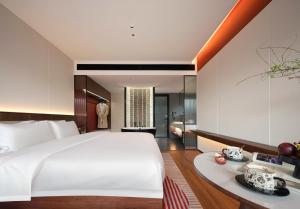 Zhangjiajie Yujie Hotel客房内的一张或多张床位