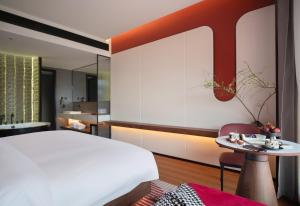 Zhangjiajie Yujie Hotel客房内的一张或多张床位