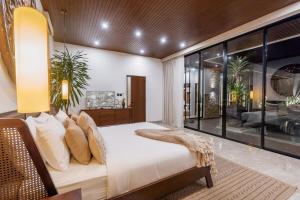 Posezení v ubytování Nococu Luxury Villa + 37 fotografií