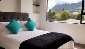 Postel nebo postele na pokoji v ubytování Apartamento moderno con balcón o terraza