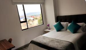 Postel nebo postele na pokoji v ubytování Apartamento moderno con balcón o terraza