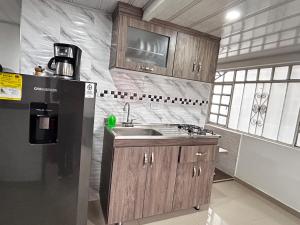 Kuchyň nebo kuchyňský kout v ubytování Cómodo