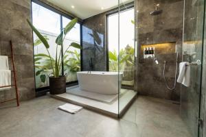 Koupelna v ubytování Nococu Luxury Villa