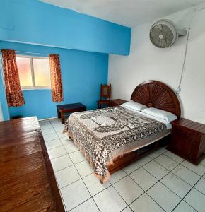Postel nebo postele na pokoji v ubytování Hotel Principal