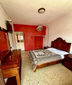 Postel nebo postele na pokoji v ubytování Hotel Principal
