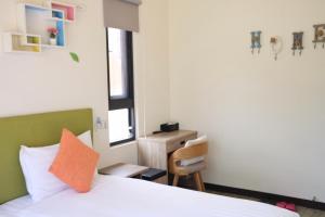 Letto o letti in una camera di Ba Ba Xiao Wu 2