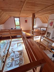 an overhead view of a room in a house at Unique Cottage House With Panoramic View On Ravnik in Hotedršica +7 photos