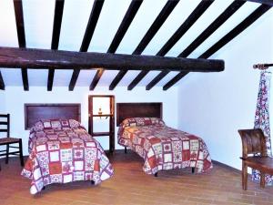 Ένα ή περισσότερα κρεβάτια σε δωμάτιο στο Cosy apartment in Mantignana with private terrace