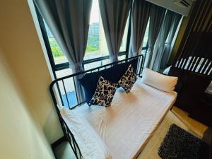 Postel nebo postele na pokoji v ubytování Ming Garden, LoveLace Suite