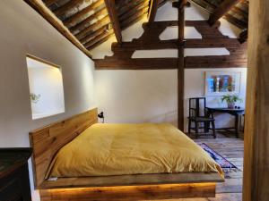 Postel nebo postele na pokoji v ubytování Secret Moon Guesthouse