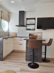 Kuchyň nebo kuchyňský kout v ubytování Appartement Havenzicht