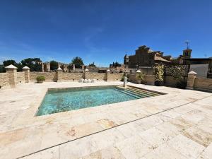 Bazén v ubytování Hotel Hacienda del Cardenal nebo v jeho okolí
