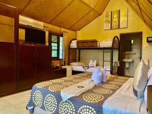 Postel nebo postele na pokoji v ubytování Homestay Chiangrai + 37 fotografií