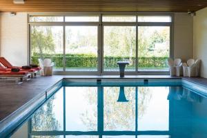 Bazén v ubytování Hotel des Bains & Wellness nebo v jeho okolí