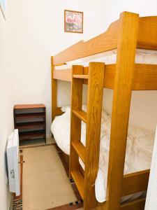 two bunk beds in a small room with a bed at Le Clos D'illies in Mers-les-Bains +38 photos