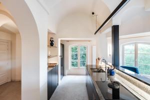 Kuchyň nebo kuchyňský kout v ubytování Paviljoen De Notelaer + 26 fotografií