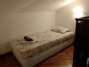 A bed or beds in a room at Pearl Apartments Sozopol