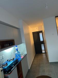 Η κουζίνα ή μικρή κουζίνα στο Bright Homes