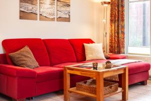 Posezení v ubytování Ferienwohnung Am Salzhaff A2