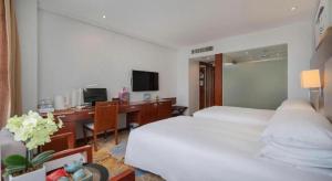 TV a/nebo společenská místnost v ubytování Xiamen Airlines Quanzhou Hotel