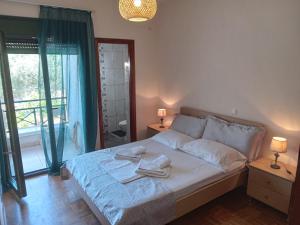 Postel nebo postele na pokoji v ubytování Villa Rodia 4 guests