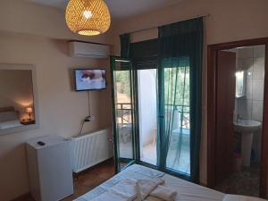 Postel nebo postele na pokoji v ubytování Villa Rodia 4 guests