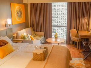 Χώρος καθιστικού στο The Hotel Residences at Acqua Tower +68 φωτογραφίες