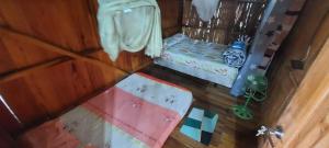 Ένα ή περισσότερα κρεβάτια σε δωμάτιο στο Mi casa de Madera
