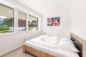 Postel nebo postele na pokoji v ubytování Dreamhouse 1 Apartment - by myNests