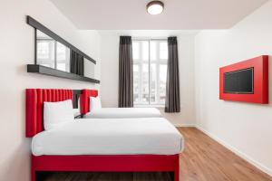 Postel nebo postele na pokoji v ubytování Tune Hotel Liverpool