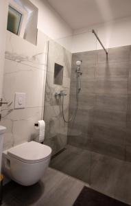 Ένα μπάνιο στο Apartmani 3T