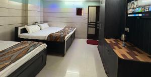 Ein Bett oder Betten in einem Zimmer der Unterkunft Pine View Guest House
