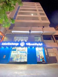 a store front of a building at night at cozy pavilion in Dubai